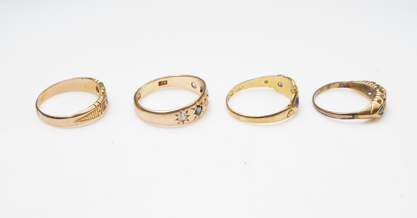 A group of four sapphire rings, late 19th/early 20th century